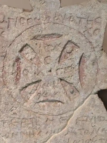 Limestone funerary stele with bas-relief cross inscribed in medallion, 6th-7th c. AD